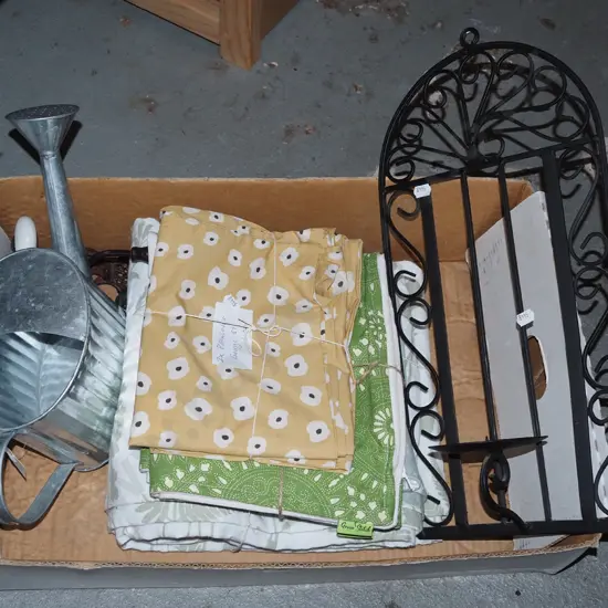 box; linen, watering can, metal candle holder