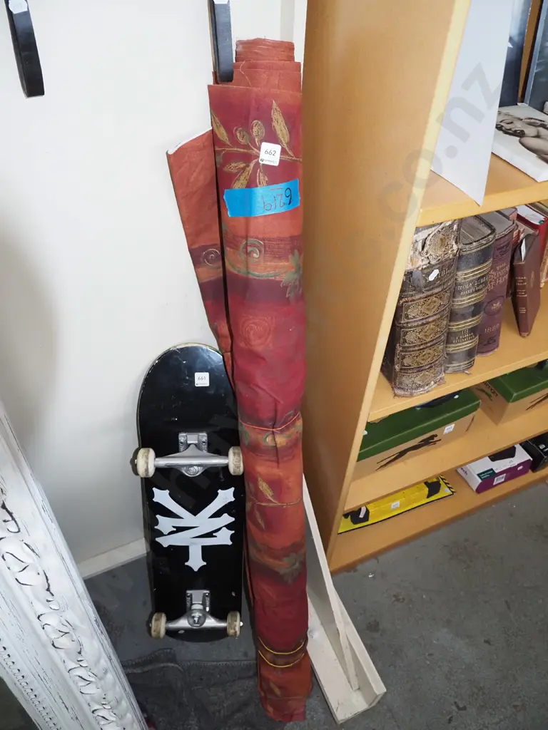 bolt of burgundy upholstery fabric Image 1++