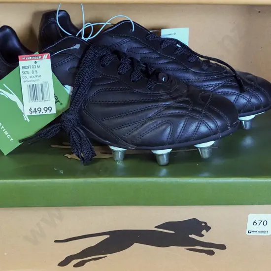 pair of size 8.5 Slazenger rugby boots