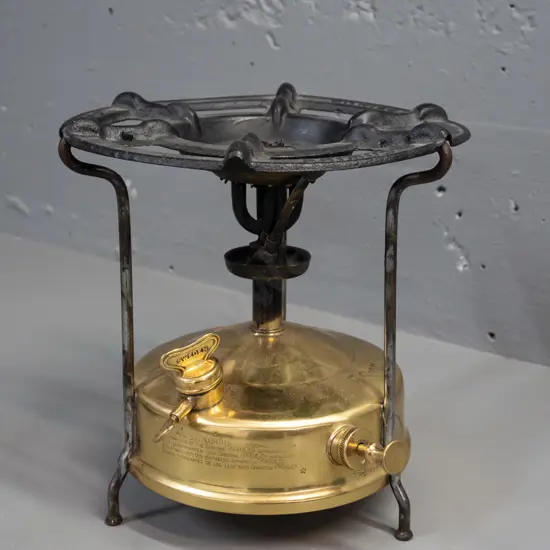 vintage Primus stove with brass tank - marked Made in Sweden. Some dents and age wear H-210 D-220