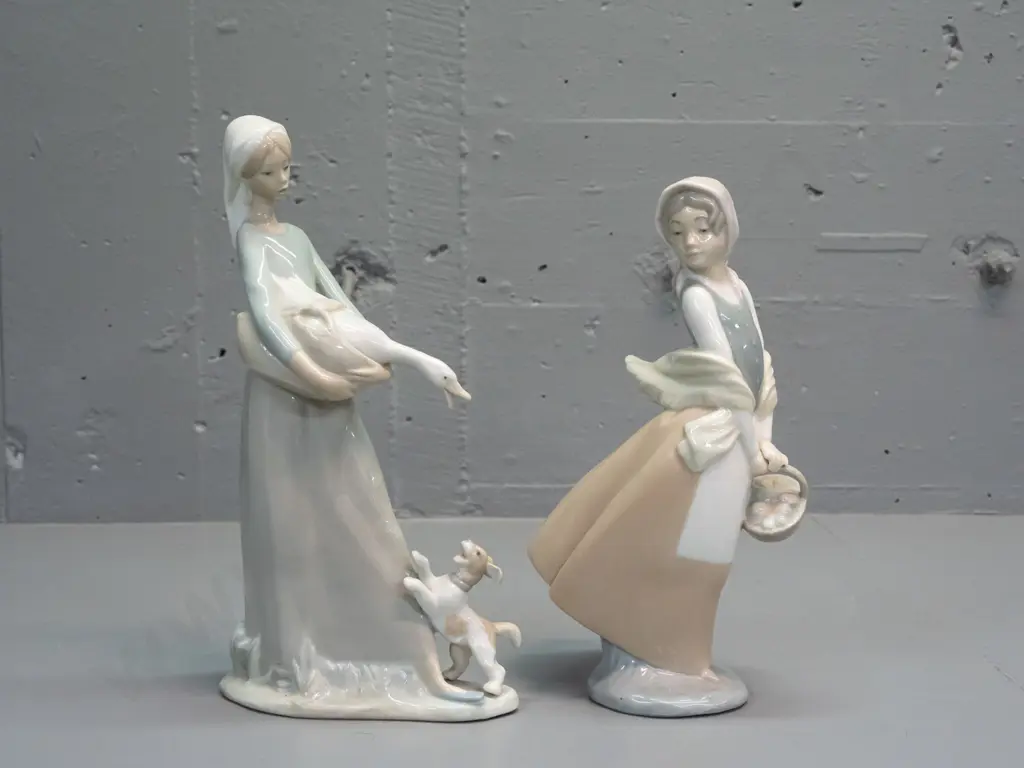 2 Nao figurines - woman with duck or goose and dog H-270 W-150 and woman with basket Image 1++