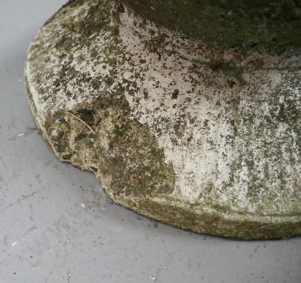 cast concrete garden planter with Greek key pattern and grape decoration on circular fluted base. Image 1++