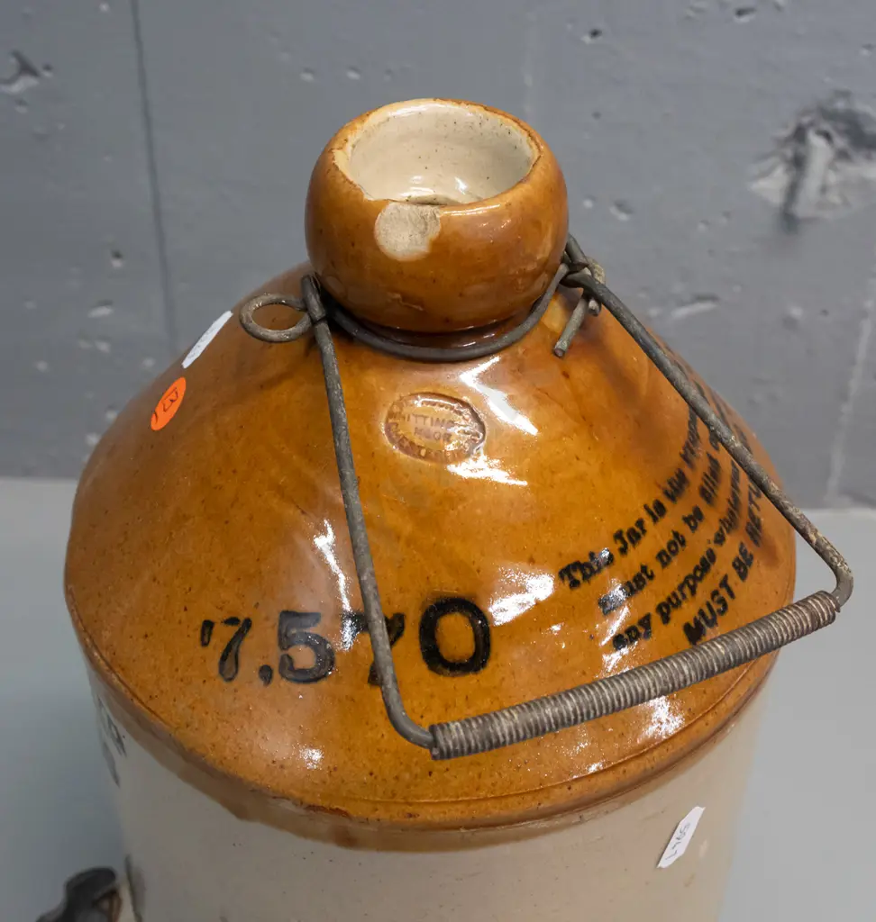 Lane's Dunedin stoneware crock with wire handle, metal spigot, Pearson's Whittington Moor Chesterfield maker's mark. Image 1++
