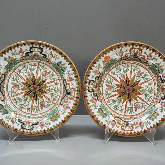 pair of Victorian Ashworth ironstone cabinet plates with Chinoiserie floral and butterfly motifs - minor staining, one