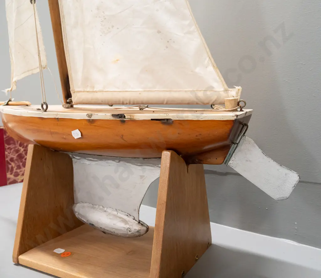 wooden pond yacht with sail on rimu stand, corrosion & deterioration to deck, staining to sail H-880 L620 Image 1++
