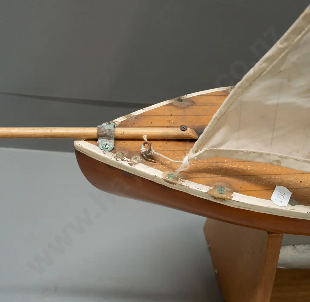 wooden pond yacht with sail on rimu stand, corrosion & deterioration to deck, staining to sail H-880 L620 Image 1++