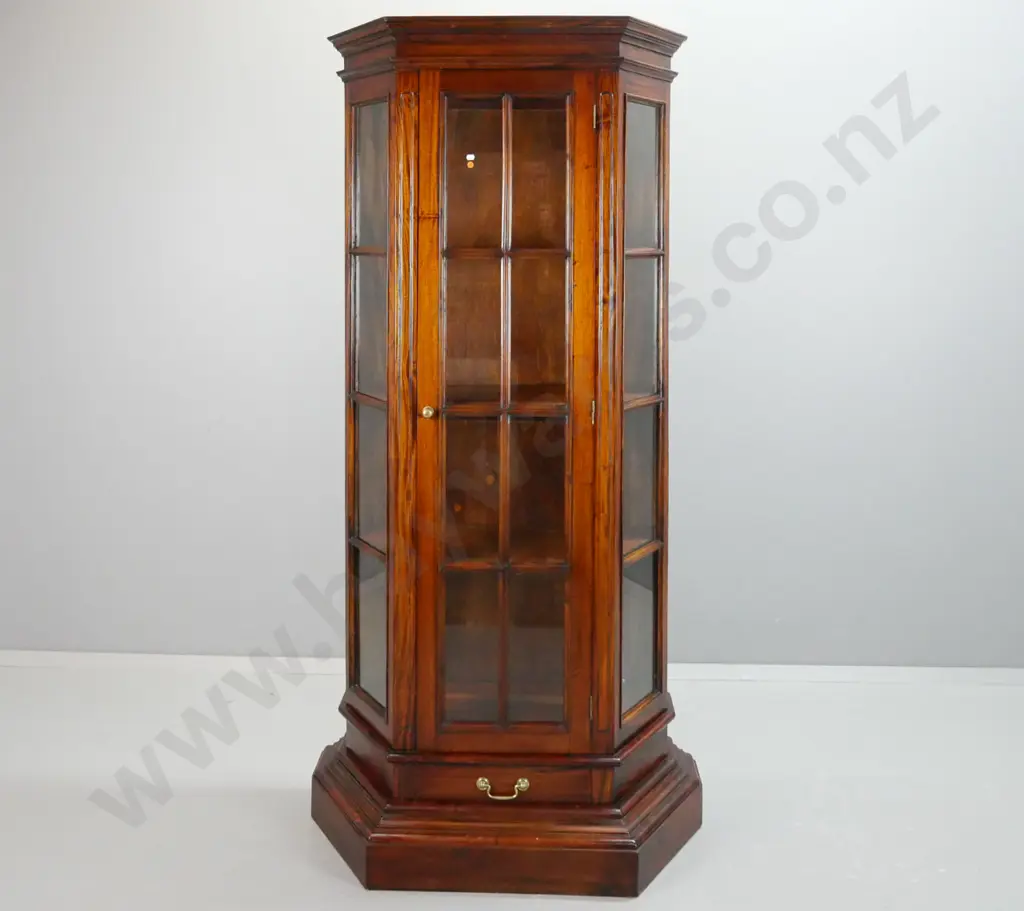 Indonesian mahogany traditional style display case with canted sides, single astragal glazed door, drawer in bottom with Image 1++