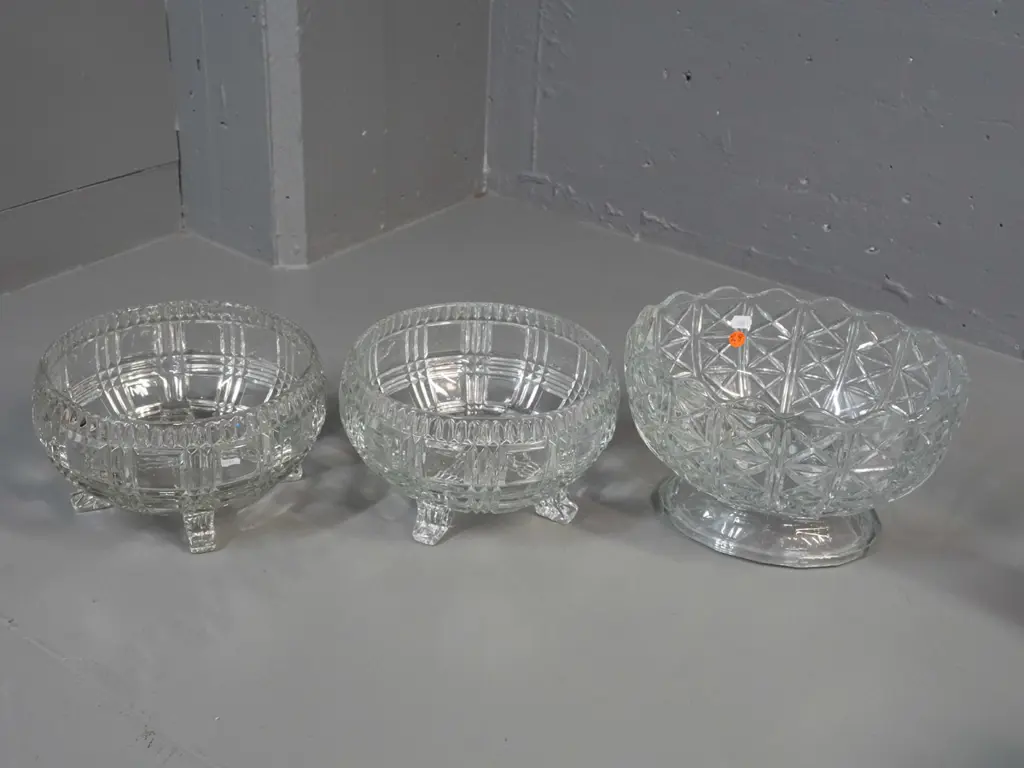3 moulded clear glass bowls - pair of 4-footed deco banded pattern fruit or salad bowls and a larger round-footed oval Image 1++