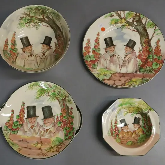 4x Royal Doulton Zunday Zmocks: footed bowl, plate, small dish, cake plate. Plate & footed bowl marked Noke. Footed bowl