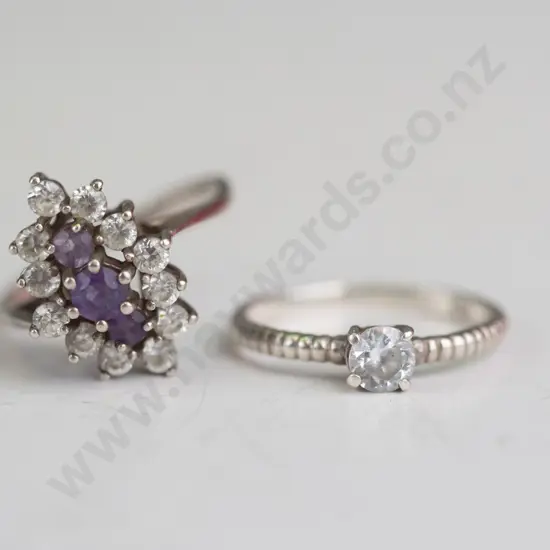 2 silver cz rings both stamped 925
