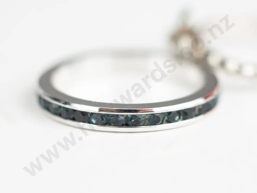 2x sterling  silver rings both stamped 925 - i with dark stones all around & i with a flower Image 1++