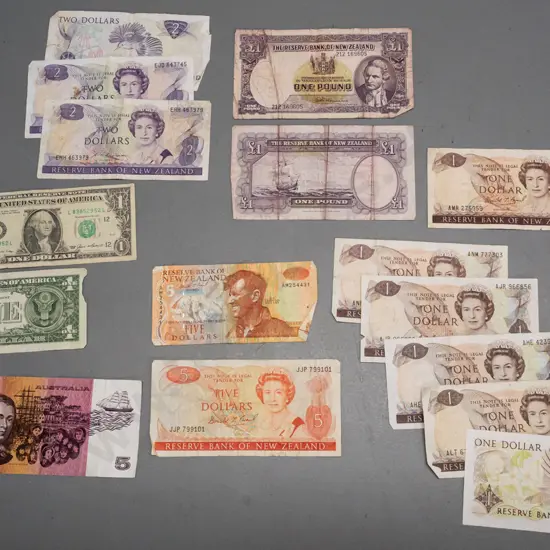 assorted New Zealand, Australian & US bank notes all in used or worn condition
