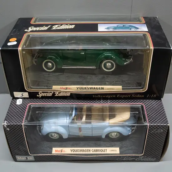 2 Maisto boxed 1:18 scale die-cast model vehicles - Silver Edition and Special Edition, both 1951 Volkswagens