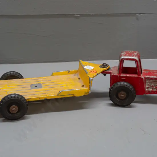 vintage cast alloy 2-wheel tractor with attached trailer - no maker's marks, has paint wear and hole in trailer where