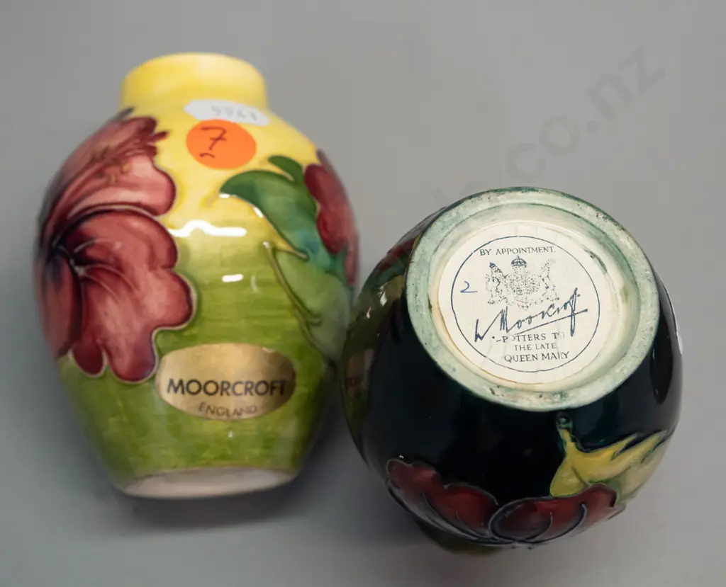 2 small Moorcroft floral vases with paper labels - both approx. H-95 Image 1++