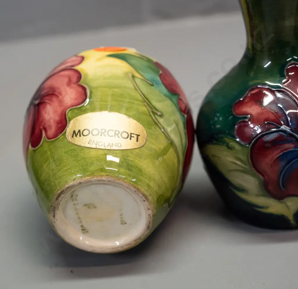 2 small Moorcroft floral vases with paper labels - both approx. H-95 Image 1++