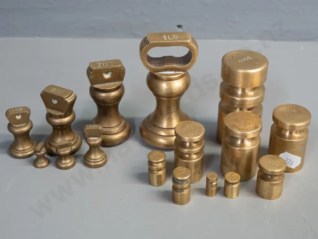 set of various brass scale weights, mixed styles and shapes including 7 bell weights, tallest 1lb. is H-90 Image 1++