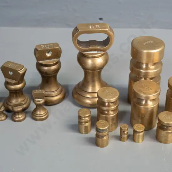 set of various brass scale weights, mixed styles and shapes including 7 bell weights, tallest 1lb. is H-90