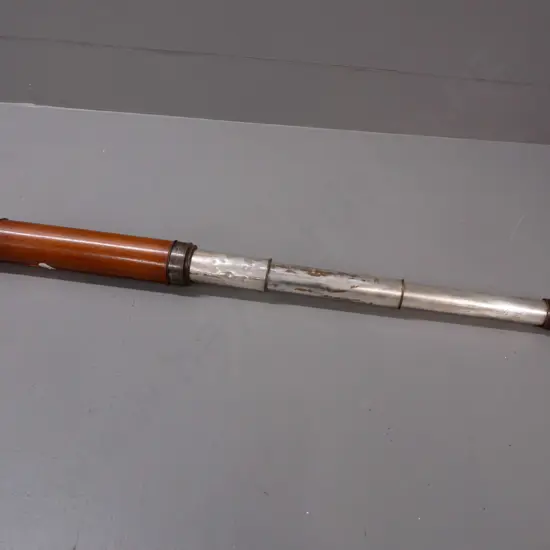 antique telescope with mahogany outer, brass eyepiece, silver plated copper inner sections, engraved Dollond London and