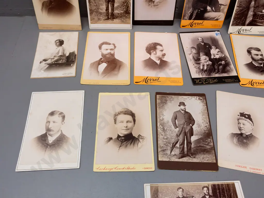 assorted large cartes de visite photographs, most are from Dunedin studios, one Wolverhampton - some have stickers Image 1++