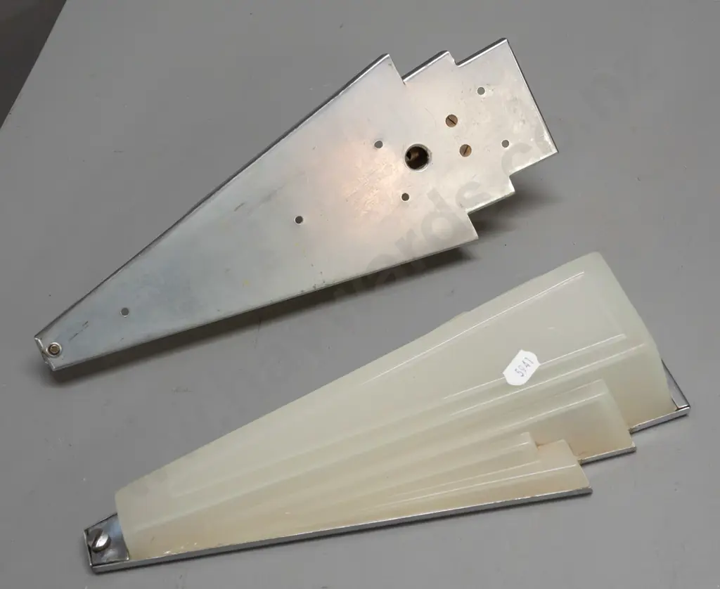 pair of art deco wall mount light fittings with faceted triangular semi-opaque glass shades, chrome backing plates. One Image 1++