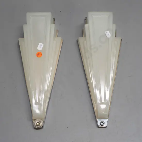 pair of art deco wall mount light fittings with faceted triangular semi-opaque glass shades, chrome backing plates. One