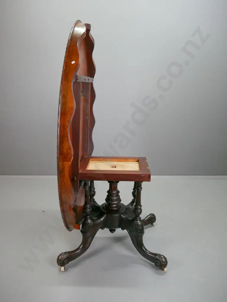 Victorian walnut dining table, with boxwood foliate inlaid top, carved foliate edge, above 4 point Image 1++