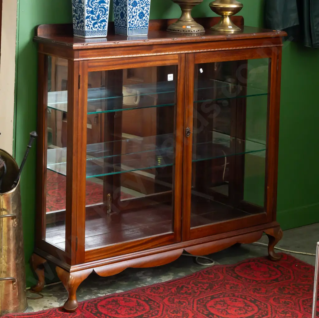 mahogany 1980's mirror backed display case with glazed sides, molded top above 2 glazed doors Image 1++