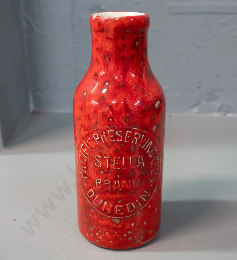 trickle glaze pottery bottle with Stella Brand Pacific Preserving Dunedin marks - reproduction cast from bottle? H-190 Image 1++