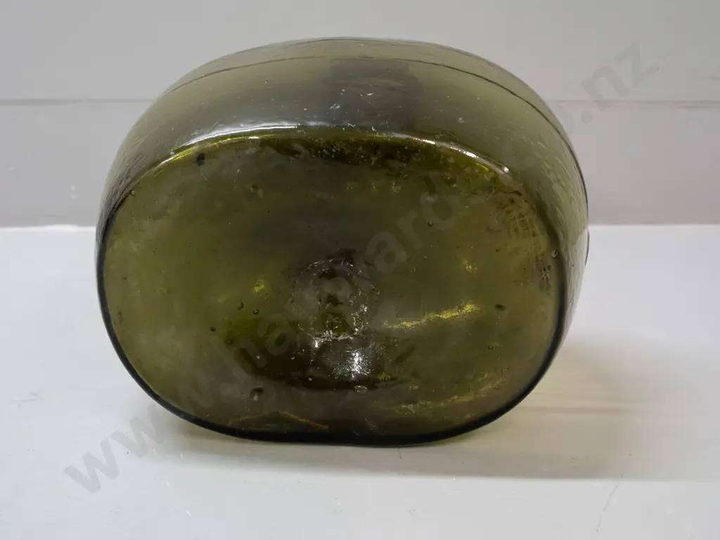 large green glass bottle - squat oval shape H-330 W-220 Image 1++