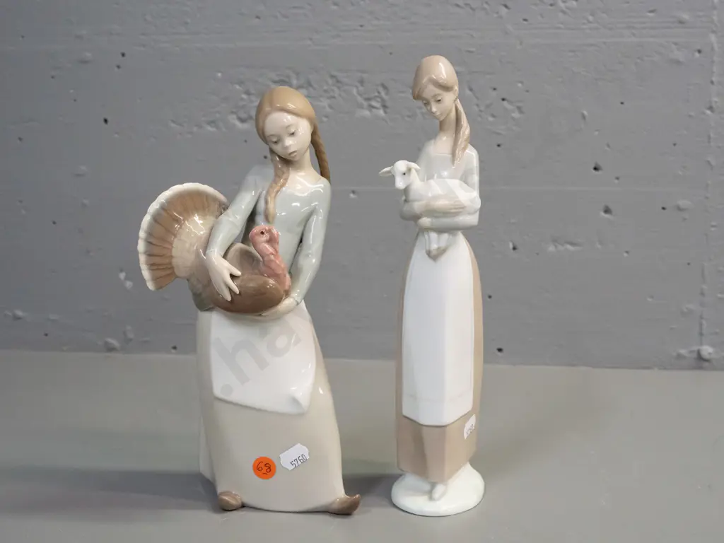 2  Lladro figurines - girl holding a turkey H-265 W-80 and a girl with lamb Image 1++