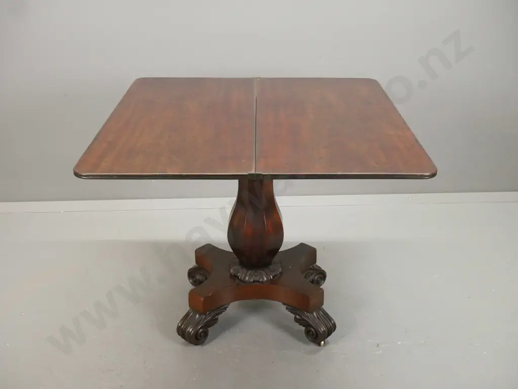 WIlliam IV mahogany tea / game table with swivel fold out top over storage cavity, faceted bolster column on 4-point Image 1++