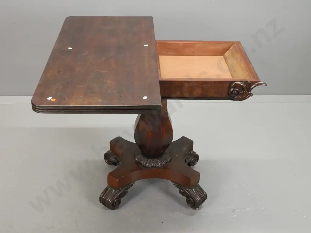 WIlliam IV mahogany tea / game table with swivel fold out top over storage cavity, faceted bolster column on 4-point Image 1++