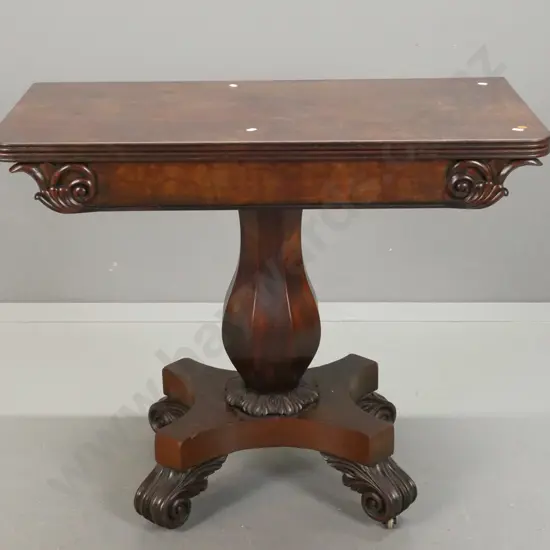 WIlliam IV mahogany tea / game table with swivel fold out top over storage cavity, faceted bolster column on 4-point