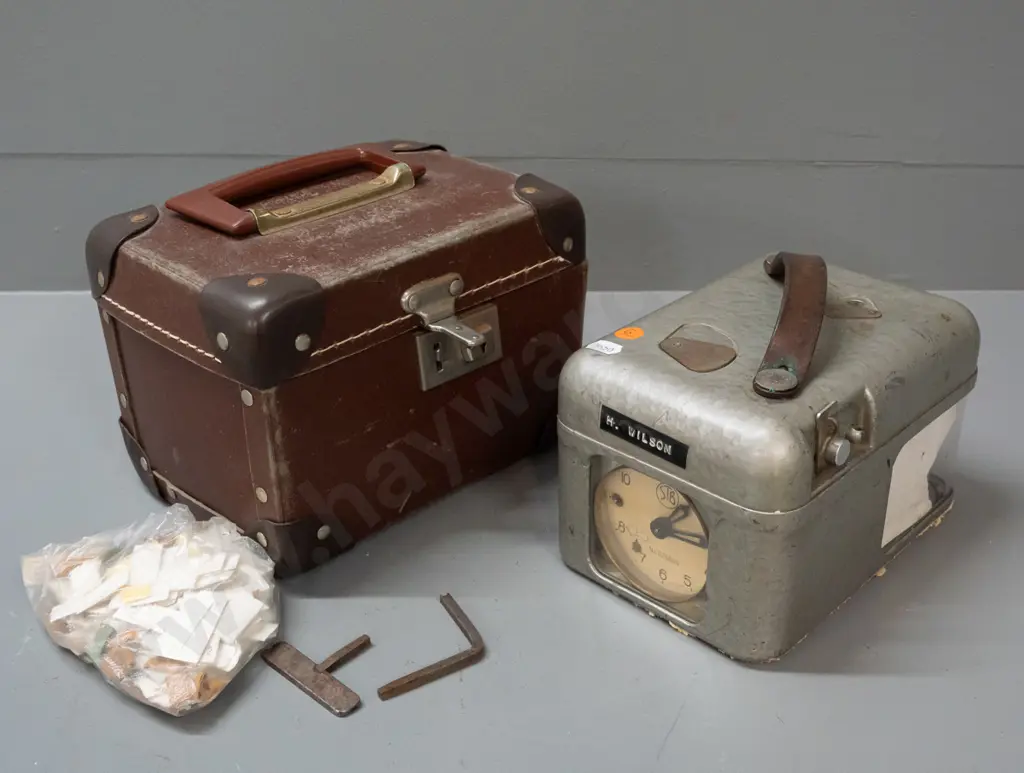 STB Swiss pigeon-racing time clock with carry case and bag of paper tags - some wear, decaying foam residue from case. Image 1++