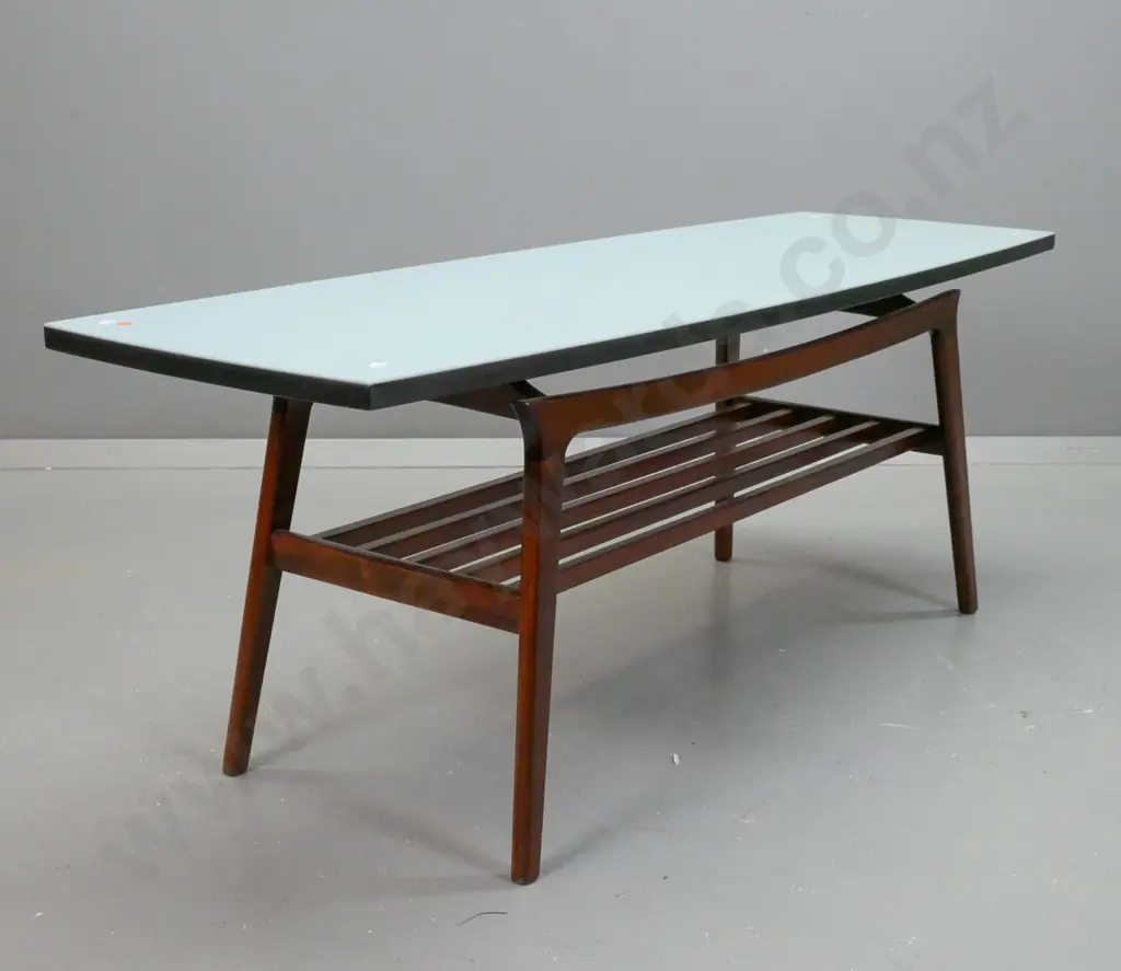 retro mahogany coffee table with slatted magazine rack, light blue painted top with black edging - some stains to top. Image 1++