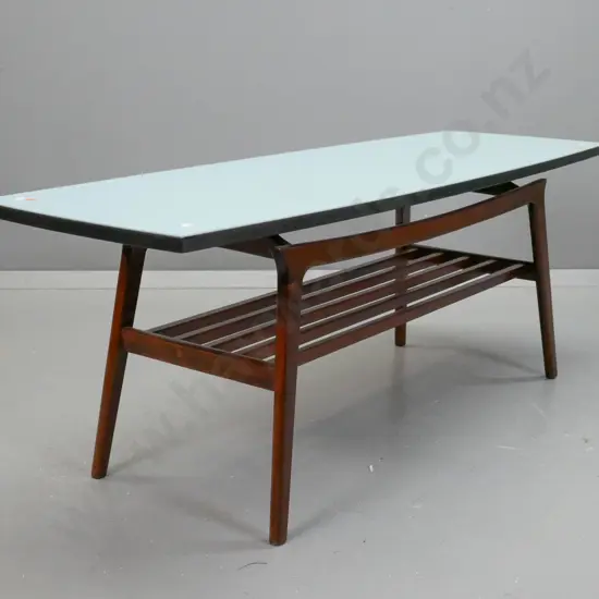 retro mahogany coffee table with slatted magazine rack, light blue painted top with black edging - some stains to top.