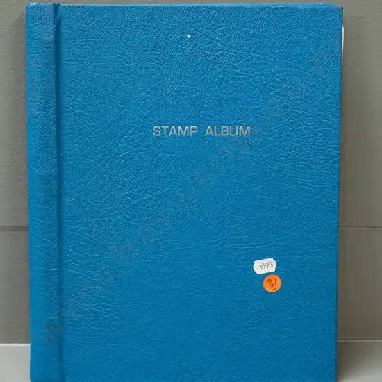 stamp album with various New Zealand stamps from 1870s thru 1980s