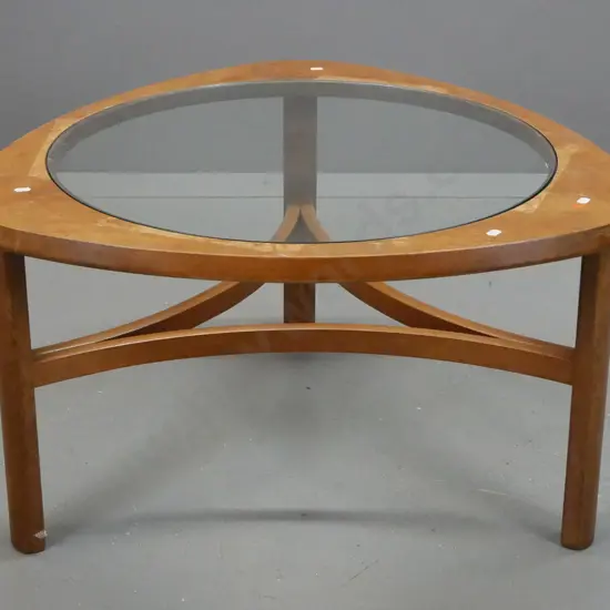 mid-century teak astro-style coffee table w/ glass insert top. Staining, scratching and marks to surface on top, some