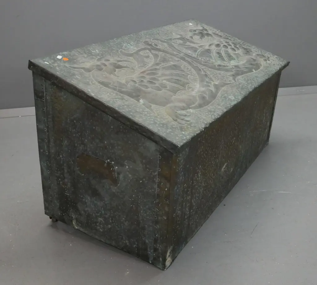 vintage hand-beaten brass woodbox, wood-lined, w/ intertwined dragons to slanted top. Deterioration to wood inside, rust Image 1++