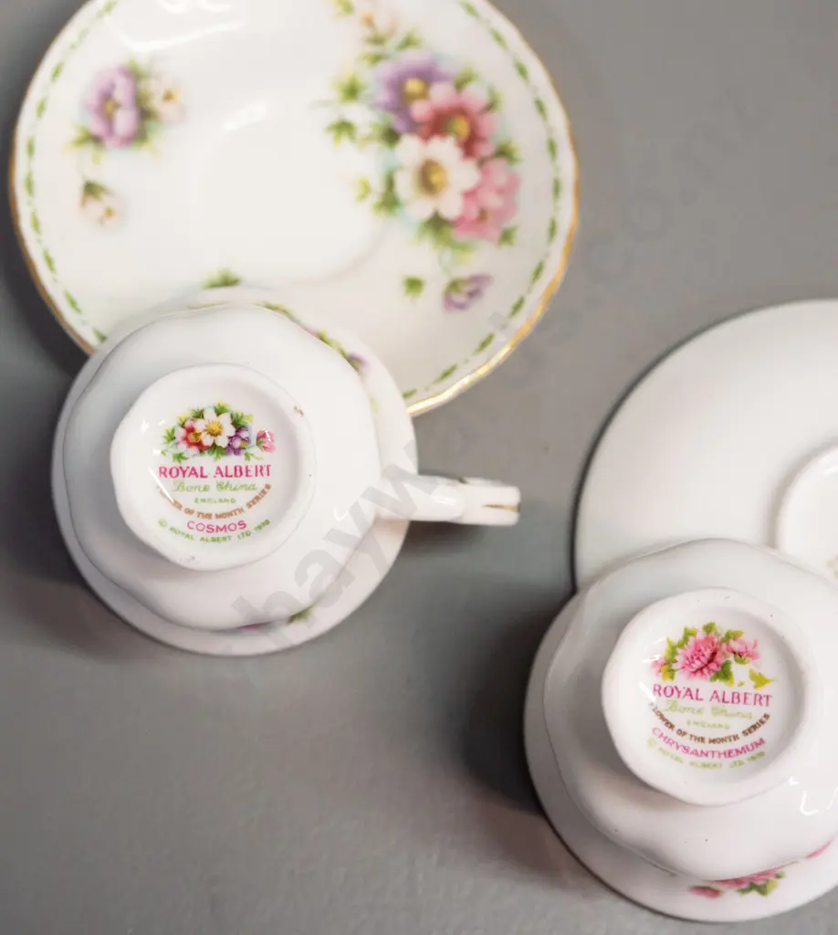 set of 12 Royal Albert months of the year miniature cups & saucers, unique patterns, all months present but July cup has Image 1++