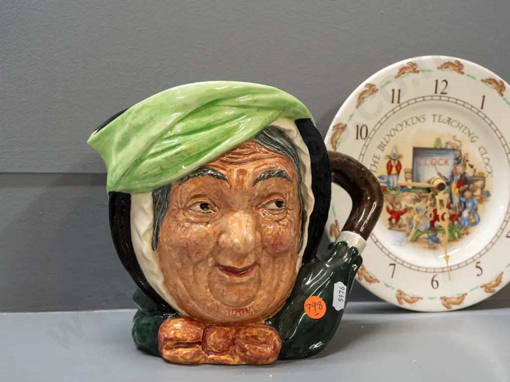 Royal Doulton large Sarey Gamp character jug H-165 and a Bunnykins wall clock - loose hands and movement need attention. Image 1++