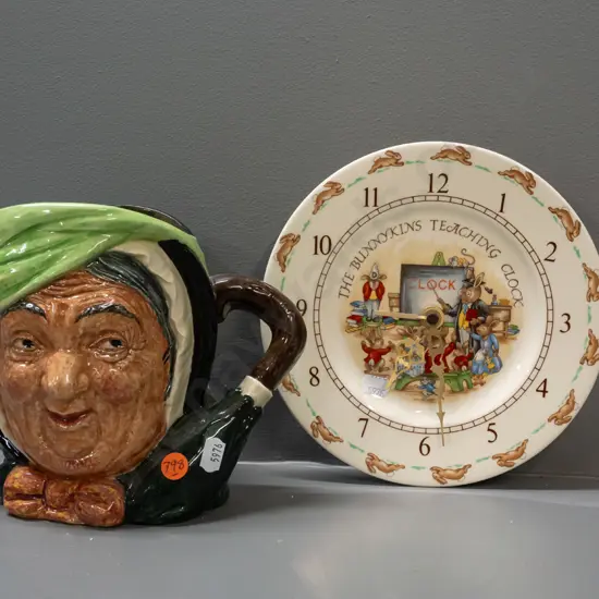 Royal Doulton large Sarey Gamp character jug H-165 and a Bunnykins wall clock - loose hands and movement need attention.