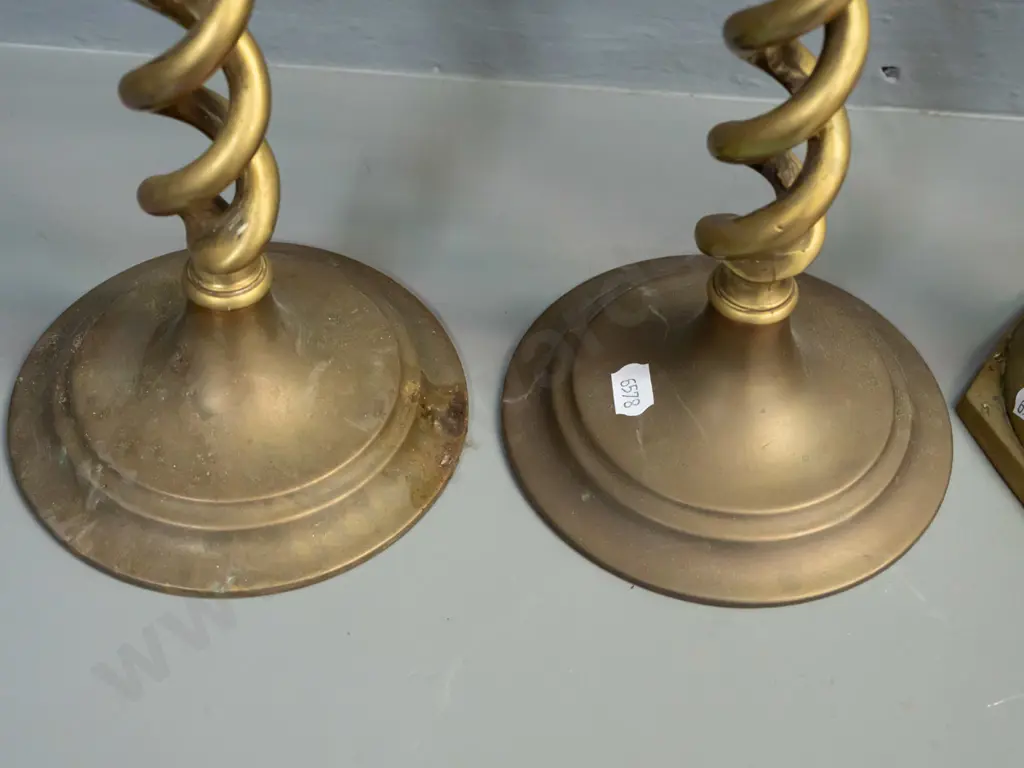 2 pairs of brass candlesticks - engraved larger pair not quite matching, and open-twist pair has some corrosion to base Image 1++