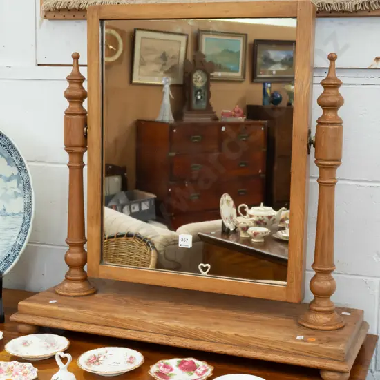 Victorian oak dresser-top rectangular mirror with turned supports, platform base on squat bun feet. Fading and marks to
