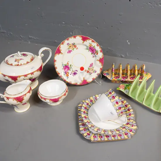 assorted English china - Aynsley teapot, cream, sugar and plate, Aynsley trio, Royal Winton toast rack and one other