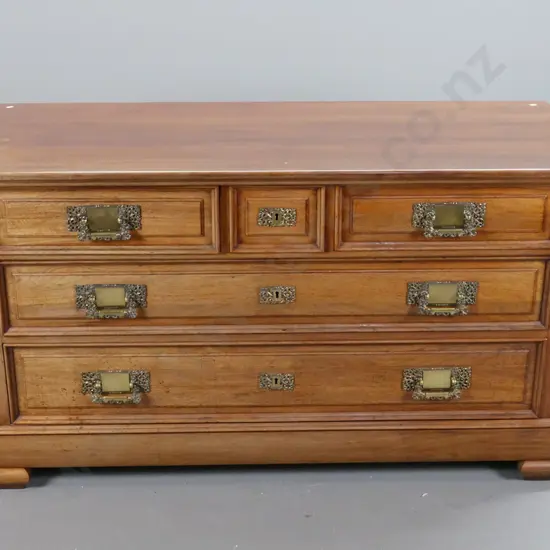 French walnut oak-lined 5 drawer chest with foliate carved corbels, panelled sides, stepped feet, rococo style