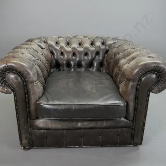 vintage leather deep button rolled arm tub chair - replacement turned feet, two are damaged, surface of leather needs