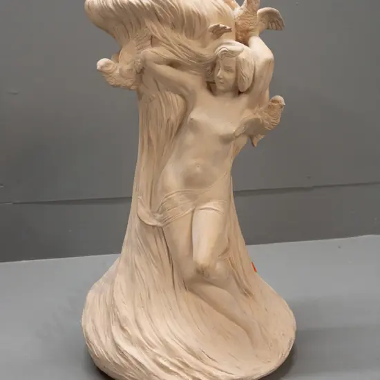 large art nouveau bisque pottery vase - maiden figure with doves, unknown mark on base. Minor chip to one bird, firing