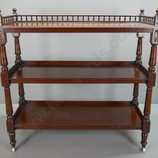 Victorian 3-tier dumb waiter with turned top gallery w/corner finials, turned supports with foliate carved blocks, on